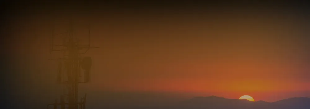 Deep orange banner with sunset